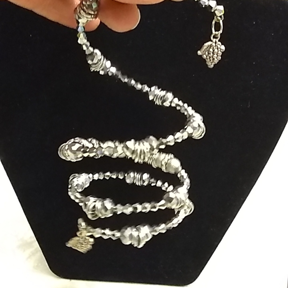 Bead and charm Slinky wrap bracelet.